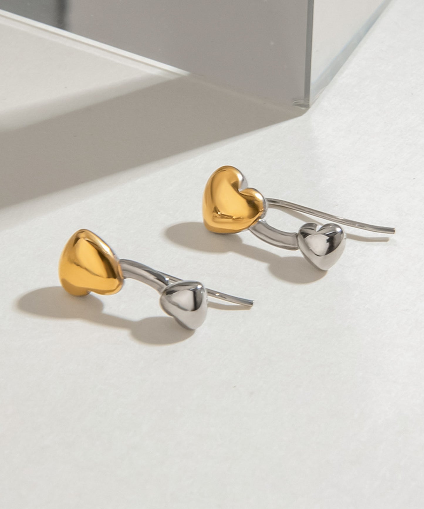 blackdia ocean バイカラーハートピアス