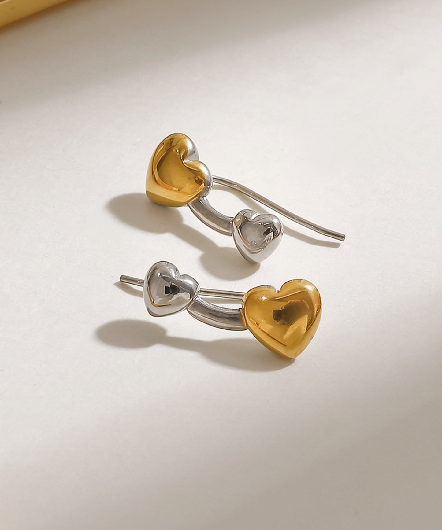 blackdia ocean バイカラーハートピアス